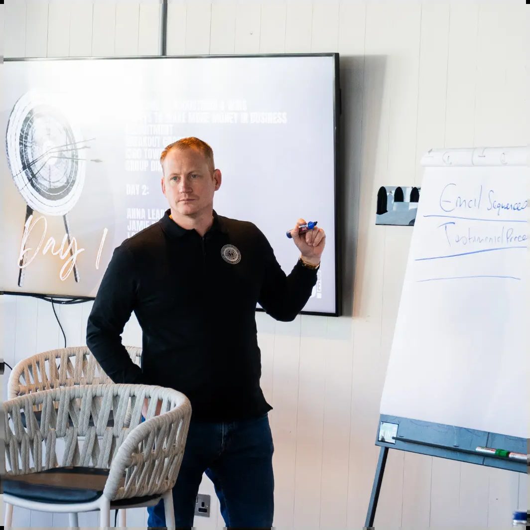 Adam Stott teaching at a flipchart